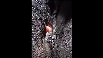 Clit-focused closeup of black beauty's orgasm